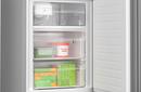 24 FREE-STANDING COUNTER DEPTH TWO DOOR BOTTOM FREEZER REFRIGERATOR WITH ICE MAKER AND INTERNAL WATER DISPENSER 