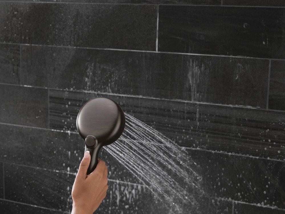 DELTA UNIVERSAL SHOWERING COMPONENTS: 7-SETTING SLIDE BAR HAND SHOWER WITH CLEANING SPRAY 