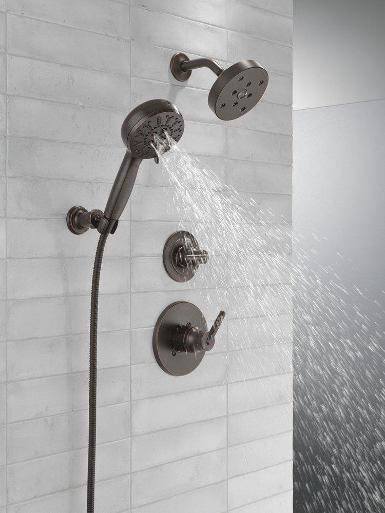 DELTA UNIVERSAL SHOWERING COMPONENTS: 7-SETTING WALL MOUNT HAND SHOWER WITH CLEANING SPRAY 