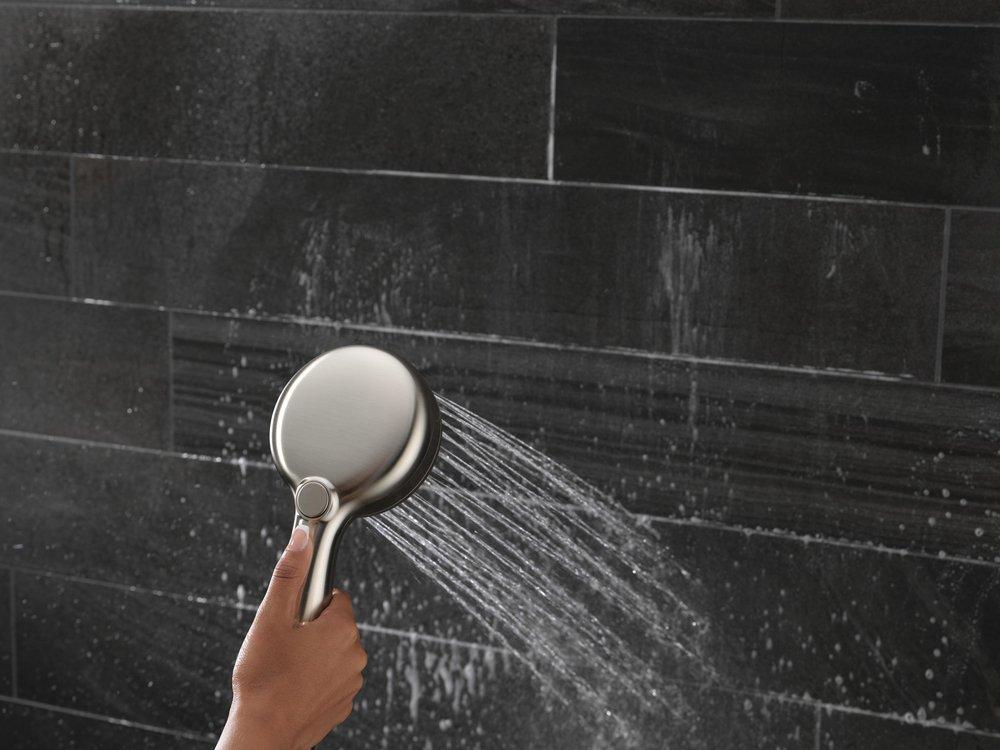 DELTA UNIVERSAL SHOWERING COMPONENTS: 7-SETTING WALL MOUNT HAND SHOWER WITH CLEANING SPRAY 