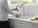 DELTA CAPERTEE: SINGLE HANDLE PULL-DOWN KITCHEN FAUCET WITH SOAP DISPENSER AND SHIELDSPRAY TECHNOLOGY 