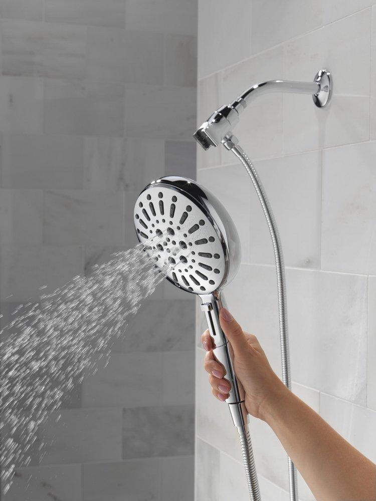 DELTA UNIVERSAL SHOWERING COMPONENTS: 7-SETTING SUREDOCK MAGNETIC HAND SHOWER 