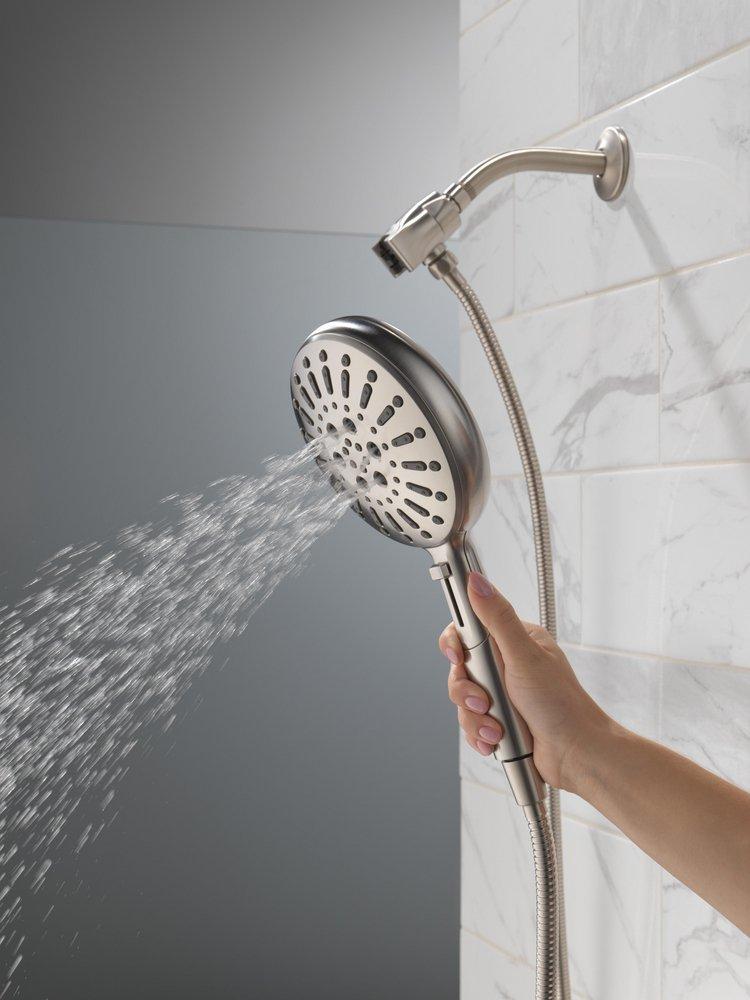 DELTA UNIVERSAL SHOWERING COMPONENTS: 7-SETTING SUREDOCK MAGNETIC HAND SHOWER 