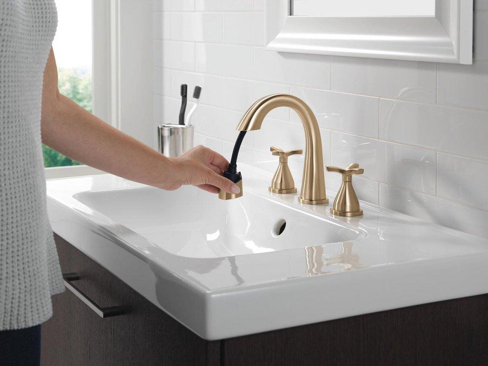 DELTA STRYKE TWO HANDLE WIDESPREAD PULL DOWN BATHROOM FAUCET 1.2 GPM  LUMICOAT CHAMPAGNE BRONZE 