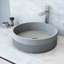 THE CYPRESS CONCRETO STONE ROUND FLUTED BATHROOM VESSEL SINK IS A BREATHTAKING BLEND OF TIMELESS ELEGANCE AND MODERN DESIGN. ITS EXTERIOR REVEALS AN INTRICATE FLUTED DESIGN ADDING A TOUCH OF ARTISTIC 