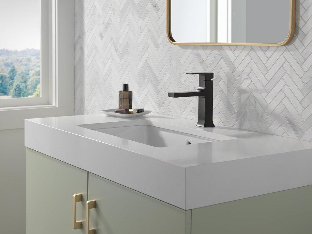 Single Handle Monoblock Bathroom Sink Faucet in Matte Black 