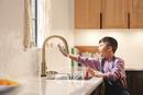 Single Handle Pull Down Kitchen Faucet with Touch and Voice Activation in Champagne Bronze 