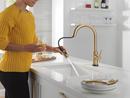 Single Handle Pull Down Kitchen Faucet with Touch and Voice Activation in Champagne Bronze 
