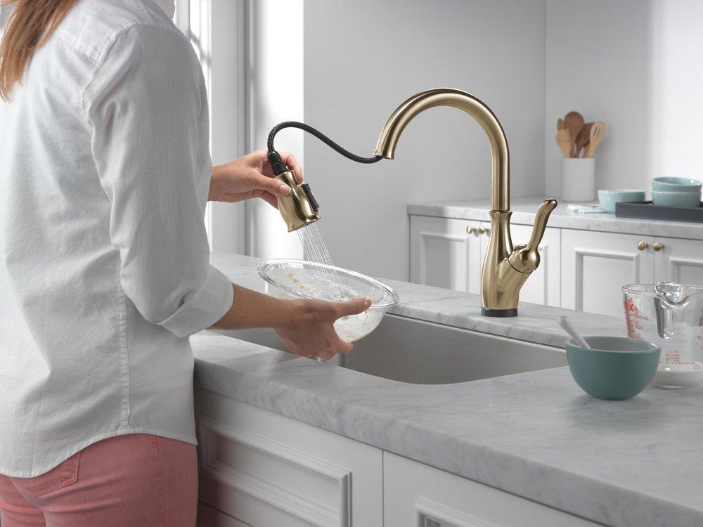 Single Handle Pull Down Kitchen Faucet with Touch Activation in Champagne Bronze 