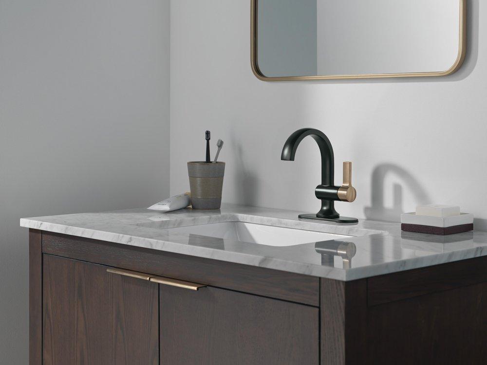 Single Handle Monoblock Bathroom Sink Faucet in Matte Black/Champagne Bronze 