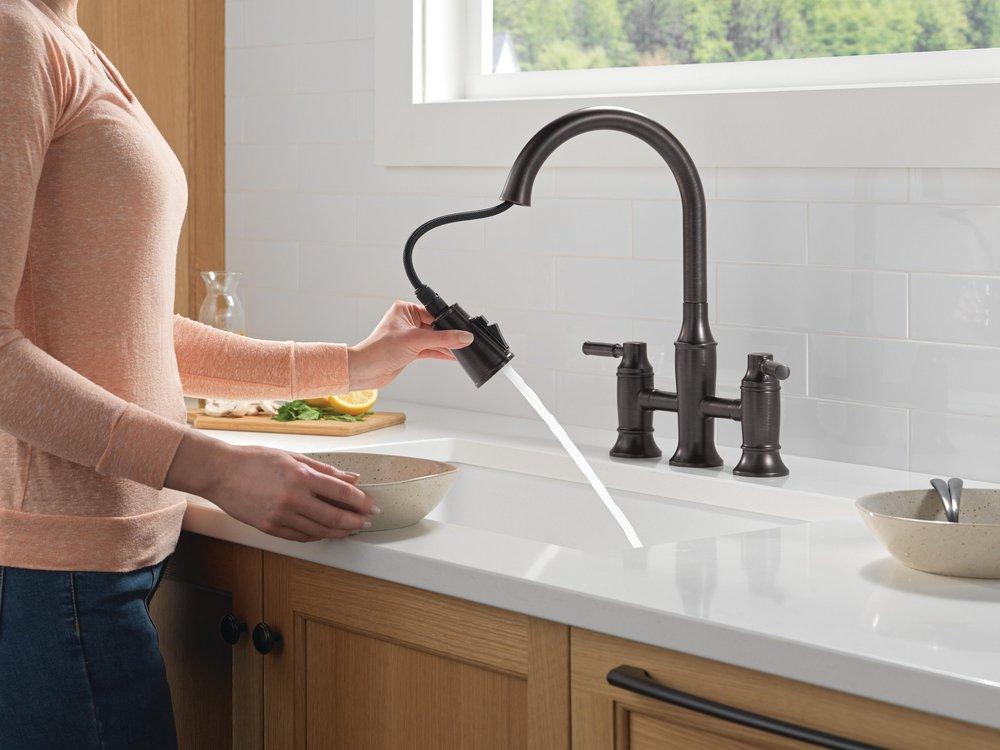 Two Handle Bridge Pull Down Kitchen Faucet in Venetian Bronze 