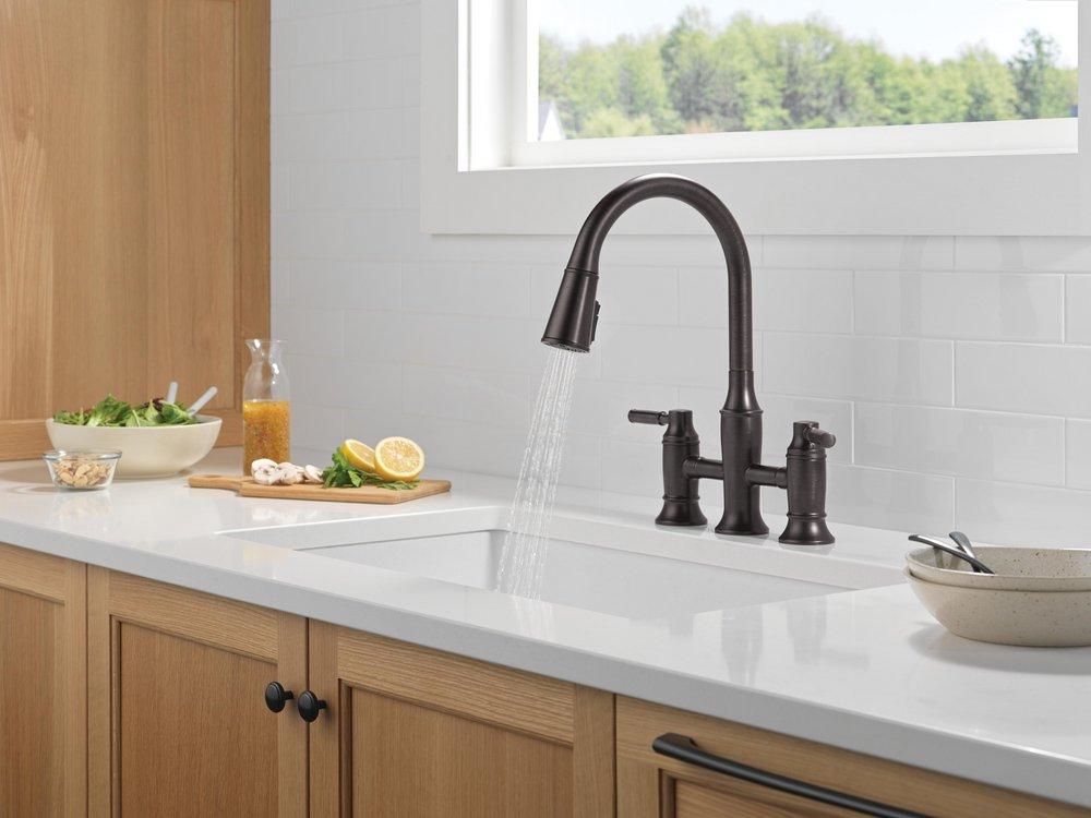 Two Handle Bridge Pull Down Kitchen Faucet in Venetian Bronze 