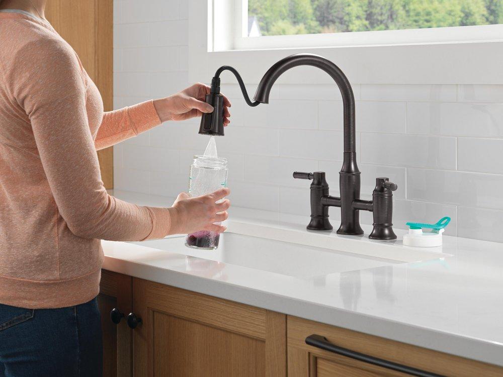 Two Handle Bridge Pull Down Kitchen Faucet in Venetian Bronze 