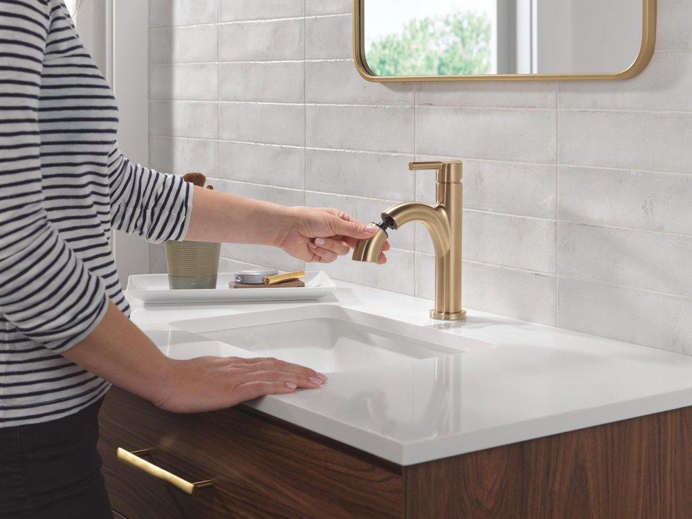 Single Handle Monoblock Bathroom Sink Faucet in Champagne Bronze 