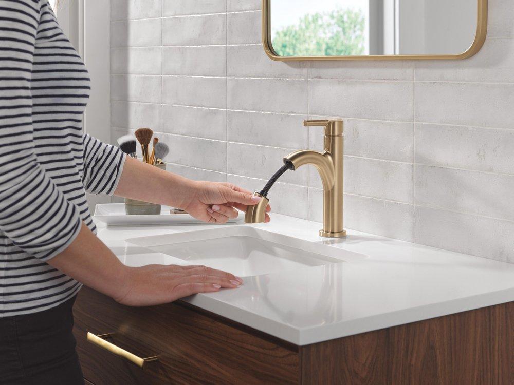 Single Handle Monoblock Bathroom Sink Faucet in Champagne Bronze 