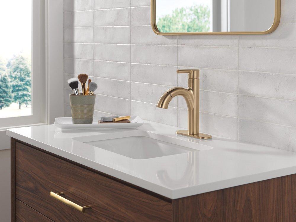 Single Handle Monoblock Bathroom Sink Faucet in Champagne Bronze 