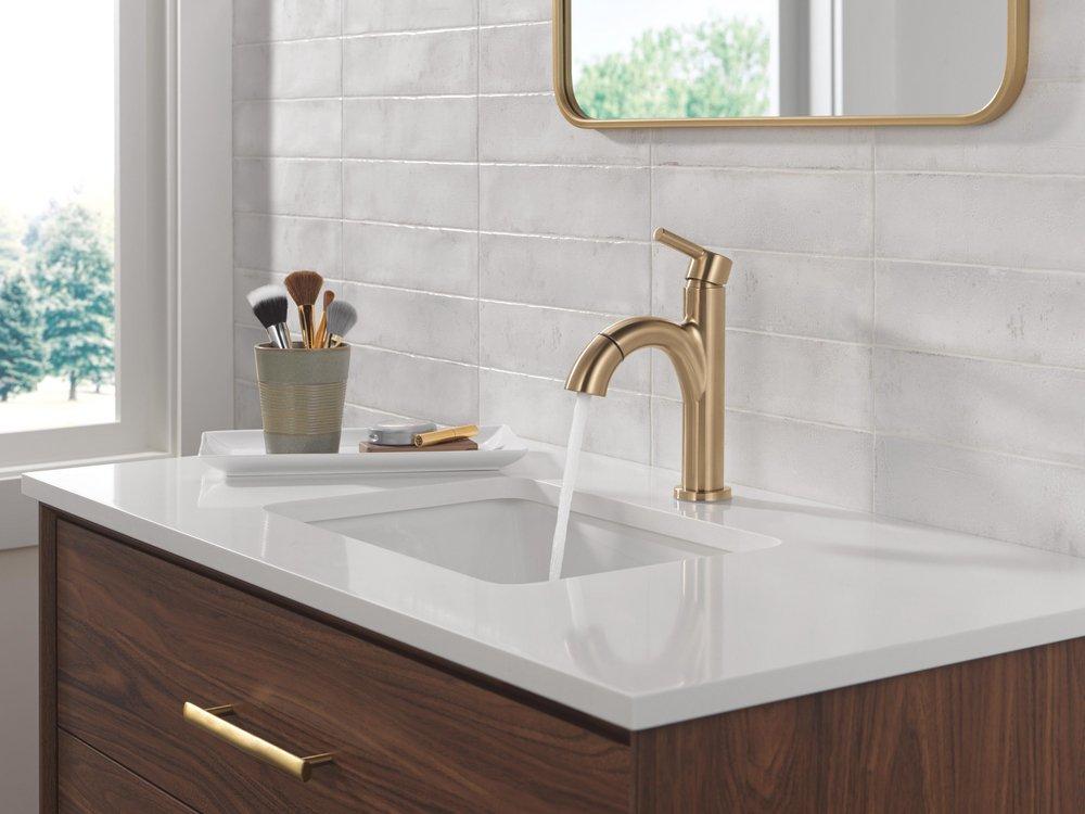 Single Handle Monoblock Bathroom Sink Faucet in Champagne Bronze 