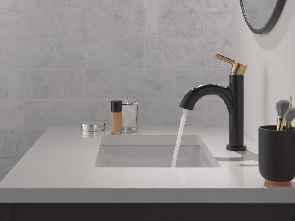 Single Handle Monoblock Bathroom Sink Faucet in Matte Black with Champagne Bronze 