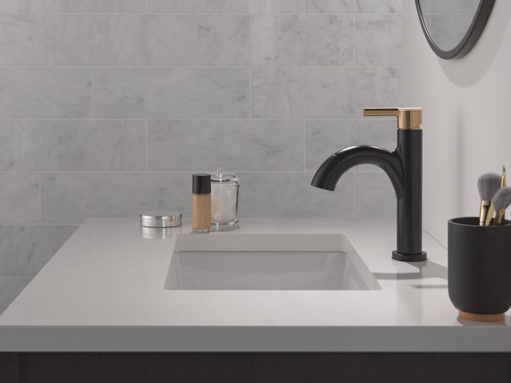 Single Handle Monoblock Bathroom Sink Faucet in Matte Black with Champagne Bronze 