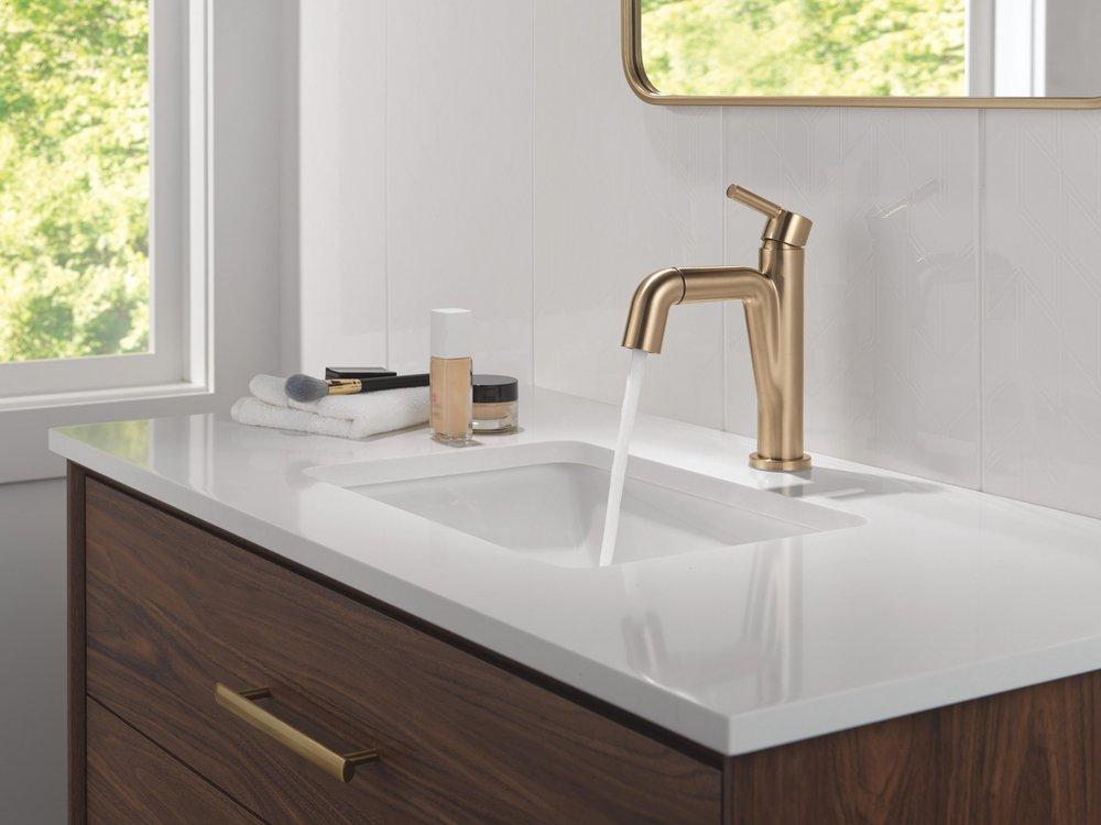 Single Handle Monoblock Bathroom Sink Faucet in Champagne Bronze 