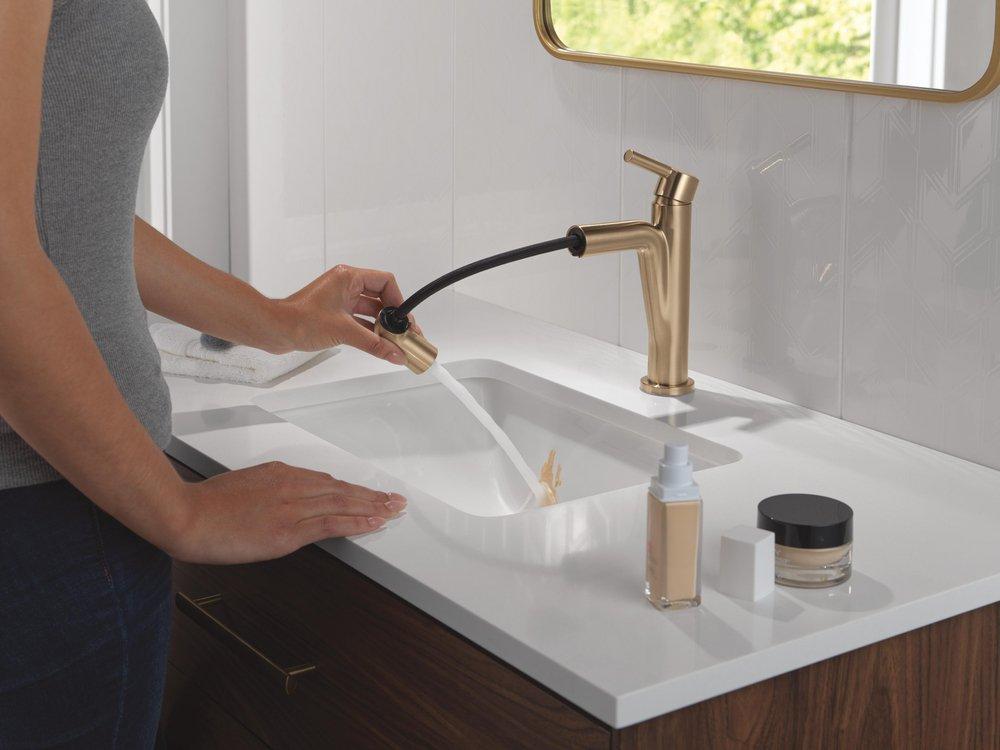Single Handle Monoblock Bathroom Sink Faucet in Champagne Bronze 
