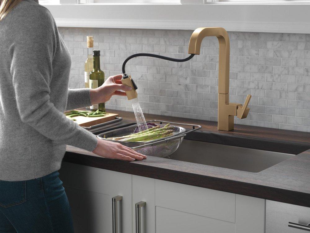 Single Handle Pull Down Kitchen Faucet in Champagne Bronze 
