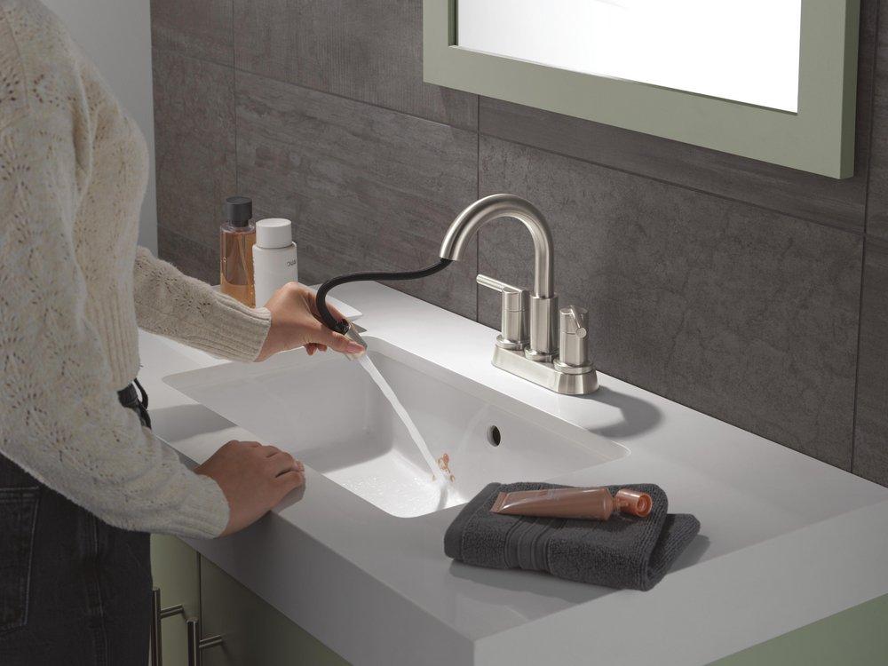 Two Handle Centerset Bathroom Sink Faucet in Stainless 