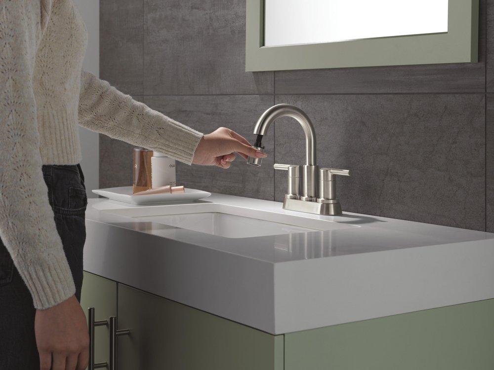Two Handle Centerset Bathroom Sink Faucet in Stainless 