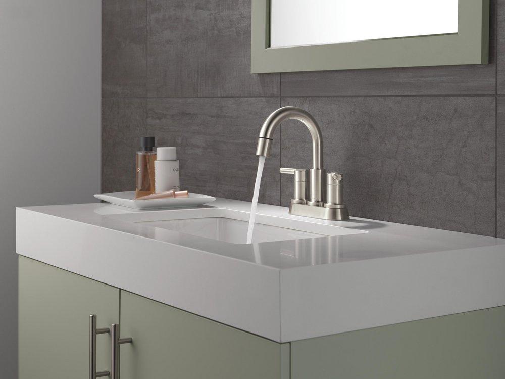 Two Handle Centerset Bathroom Sink Faucet in Stainless 