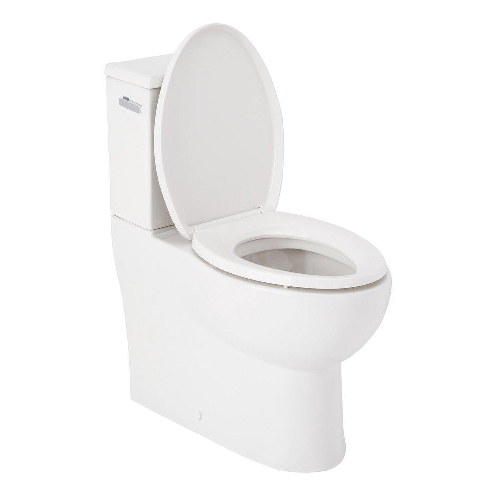 Two Piece Elongated Skirted Toilet with Reversible Tank and Chrome Handle, Less Toilet Seat 