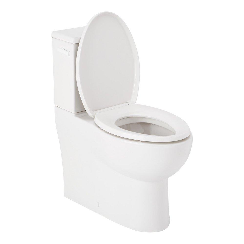 Two Piece Elongated Skirted Toilet with Reversible Tank and White Handle, Less Toilet Seat 