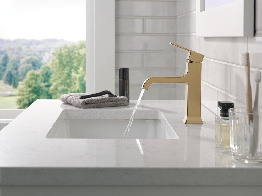 Single Handle Monoblock Bathroom Sink Faucet in Champagne Bronze 