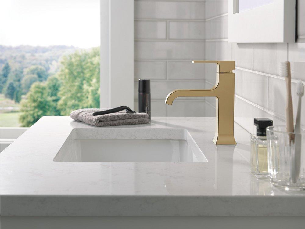 Single Handle Monoblock Bathroom Sink Faucet in Champagne Bronze 
