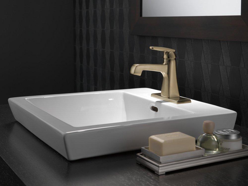 Single Handle Monoblock Bathroom Sink Faucet in Champagne Bronze 