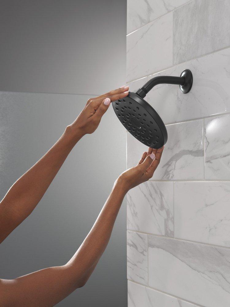DELTA UNIVERSAL SHOWERING COMPONENTS: PIVOTPRO RAINCAN SHOWER HEAD 
