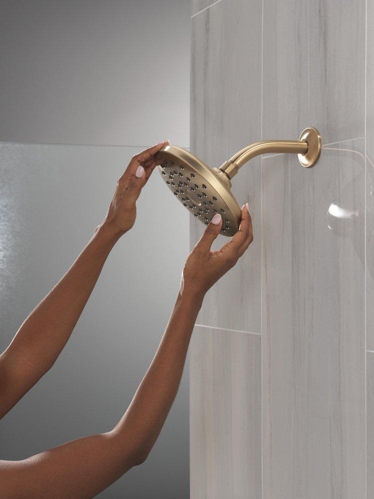 DELTA UNIVERSAL SHOWERING COMPONENTS: PIVOTPRO RAINCAN SHOWER HEAD 