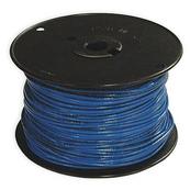 Silo image of blue, coiled electrical wire.