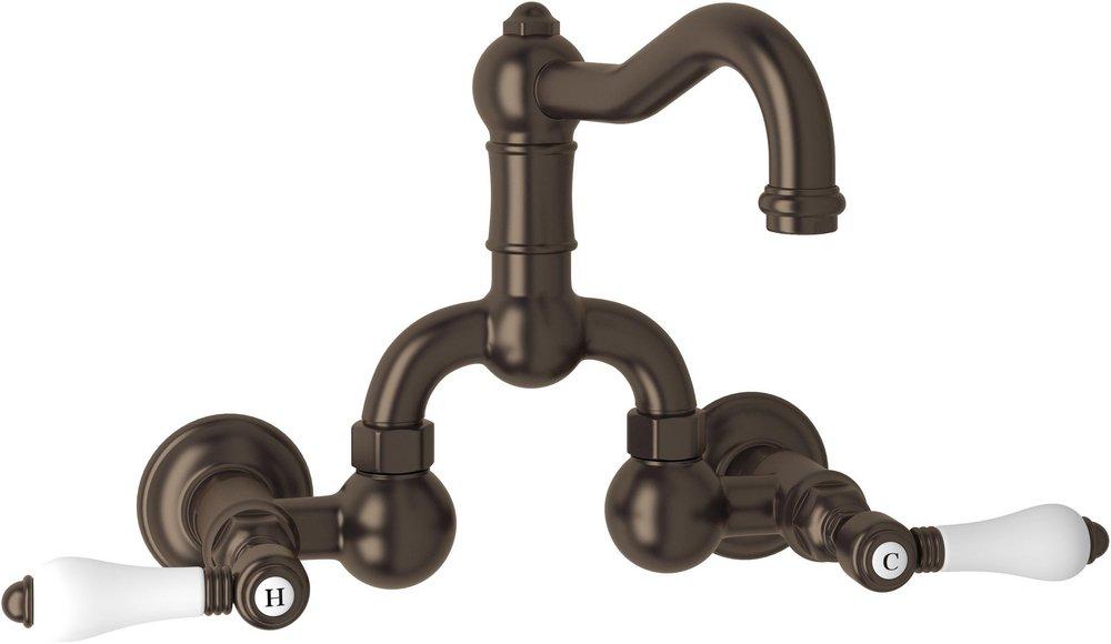 ROHL&reg; Tuscan Brass Wall Mount Bridge Bathroom Sink Faucet with Double Porcelain Lever Handle 