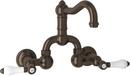 ROHL&reg; Tuscan Brass Wall Mount Bridge Bathroom Sink Faucet with Double Porcelain Lever Handle 