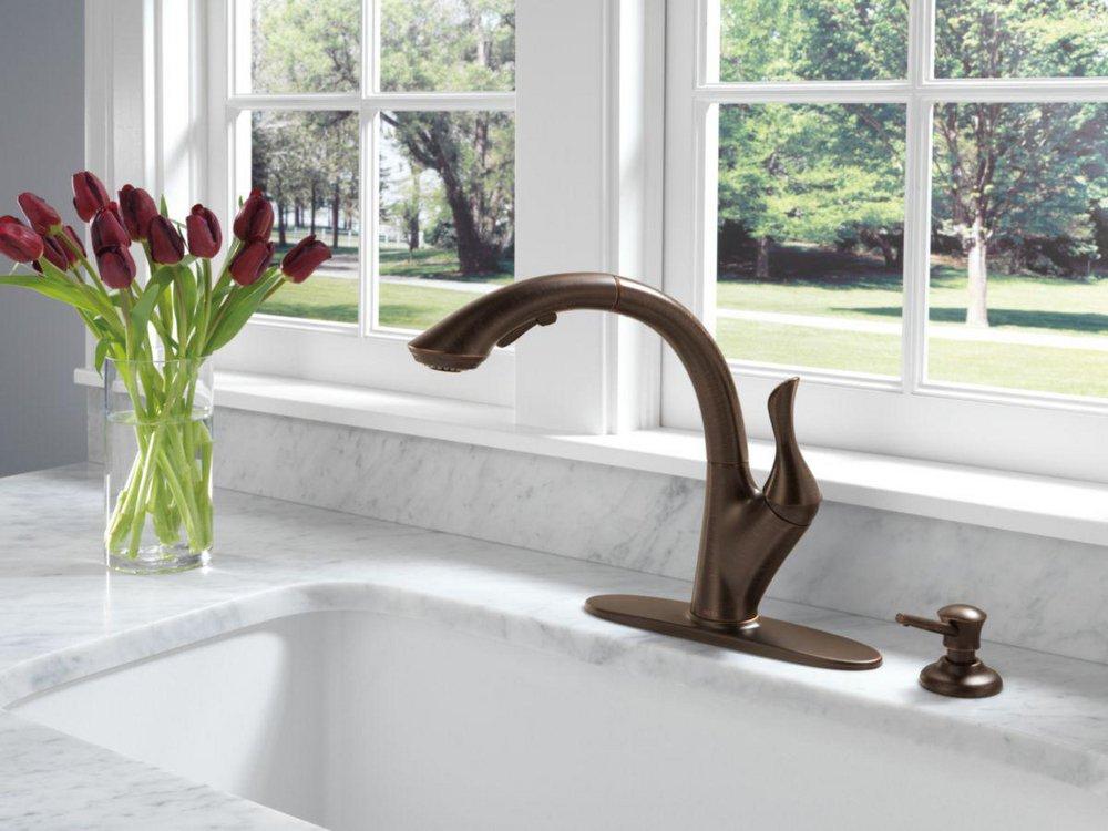 Delta Faucet Venetian Bronze 13 oz. Deck Mount Plastic Soap and Lotion Dispenser 