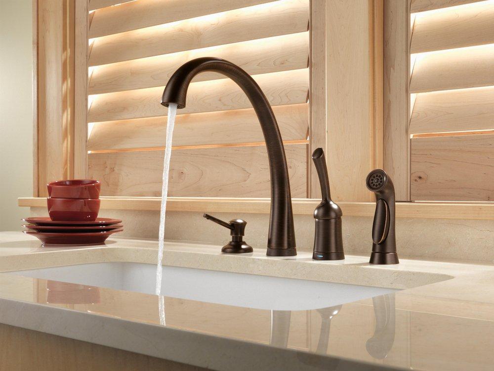 Delta Faucet Venetian Bronze 13 oz. Deck Mount Plastic Soap and Lotion Dispenser 