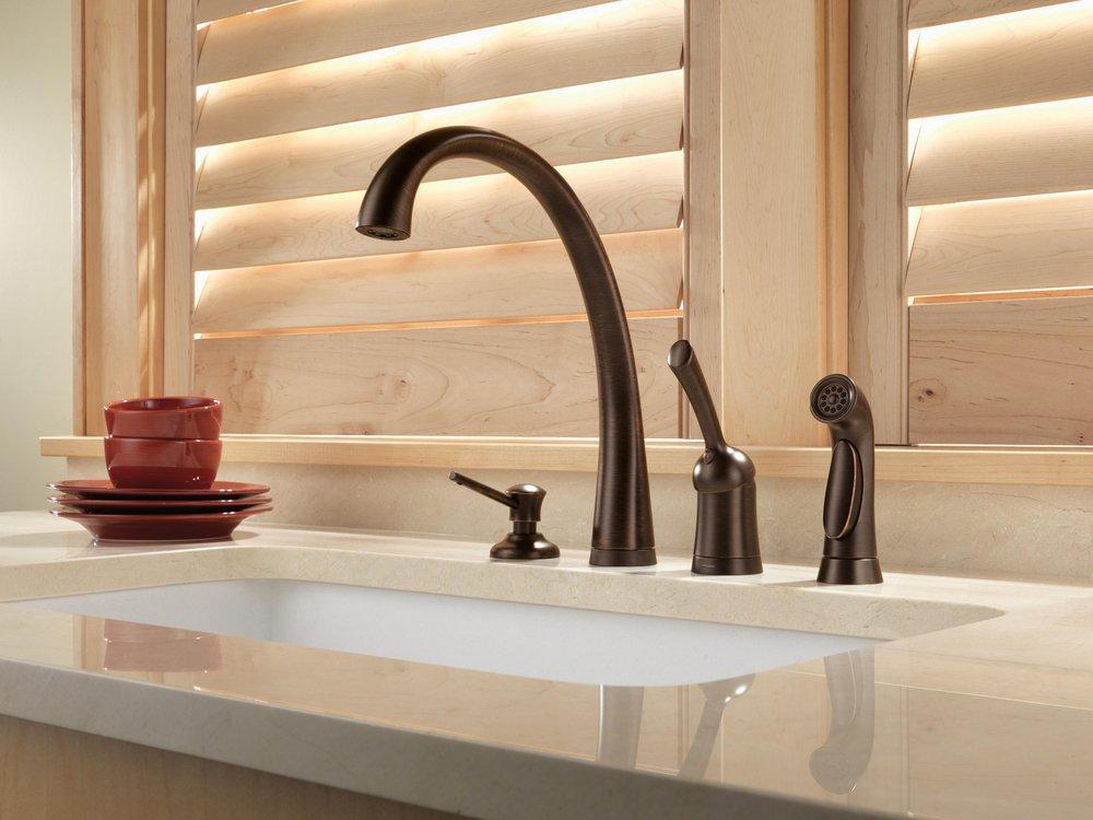 Delta Faucet Venetian Bronze 13 oz. Deck Mount Plastic Soap and Lotion Dispenser 