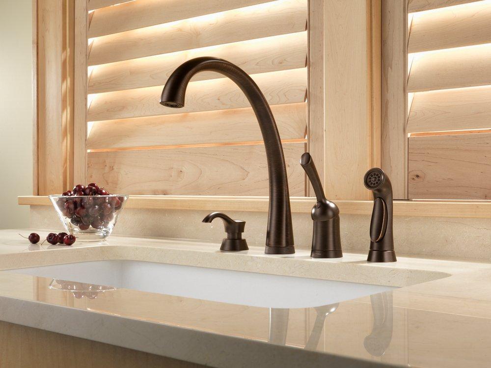 Delta Faucet Polished Chrome Single Handle Touch Activated Kitchen Faucet with Side Spray and Touch2O Technology 