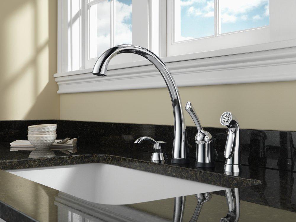 Delta Faucet Polished Chrome Single Handle Touch Activated Kitchen Faucet with Side Spray and Touch2O Technology 