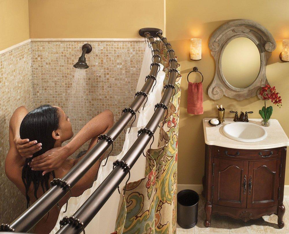Moen Old World Bronze 60 in. Adustable Double Curve Shower Rod 