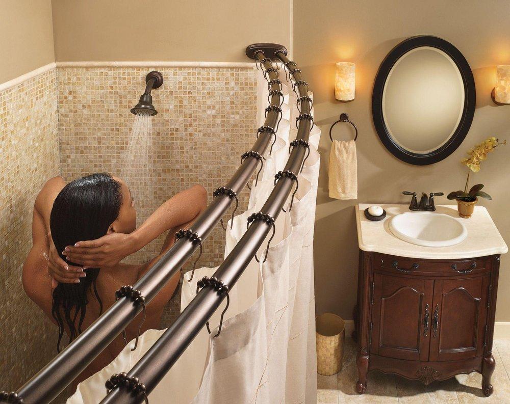 Moen Old World Bronze 60 in. Adustable Double Curve Shower Rod 