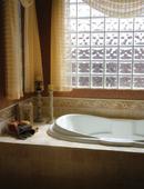 Hydro Systems White 72 x 38 in. 113 gal Hydroluxe Solid Surface Oval Freestanding Bathtub with Center Drain 