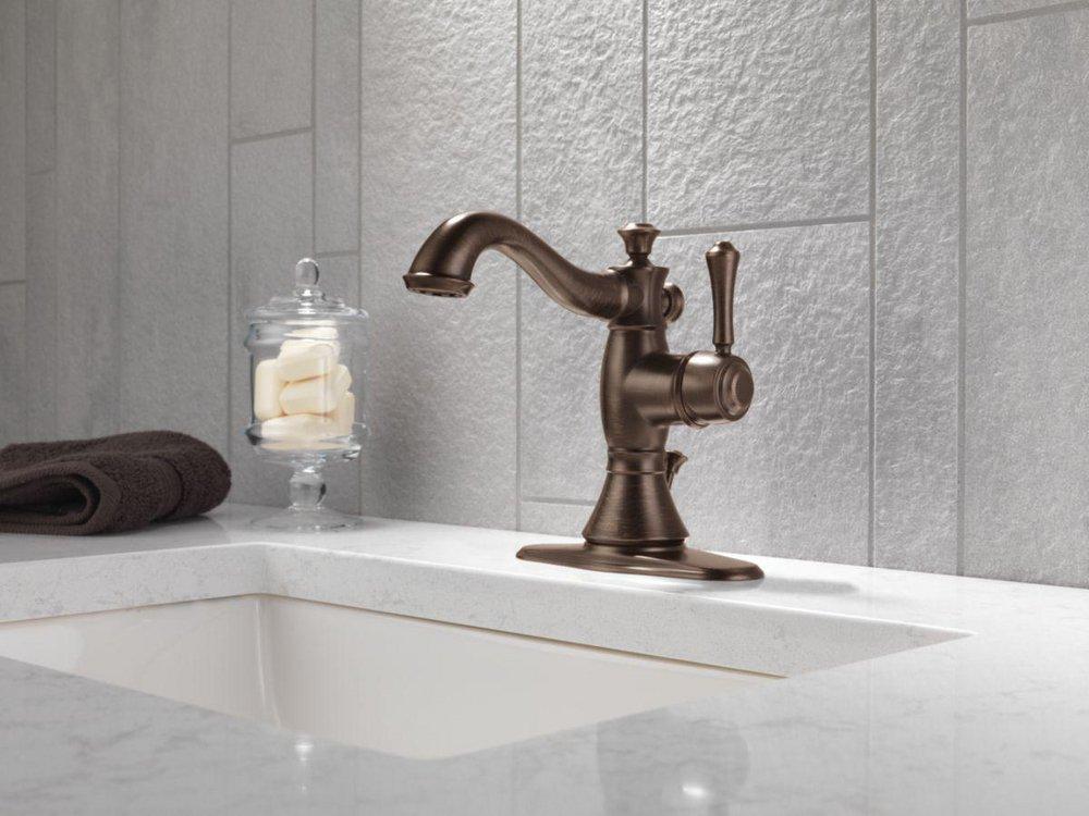Delta Faucet Venetian Bronze Single Handle Centerset Bathroom Sink Faucet with Pop-Up Drain Assembly 