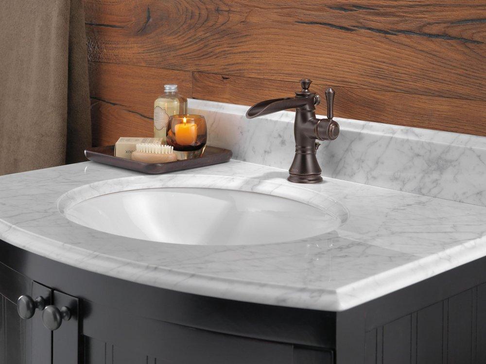 Delta Faucet Venetian Bronze Single Handle Centerset Waterfall Bathroom Sink Faucet with Pop-Up Drain Assembly 