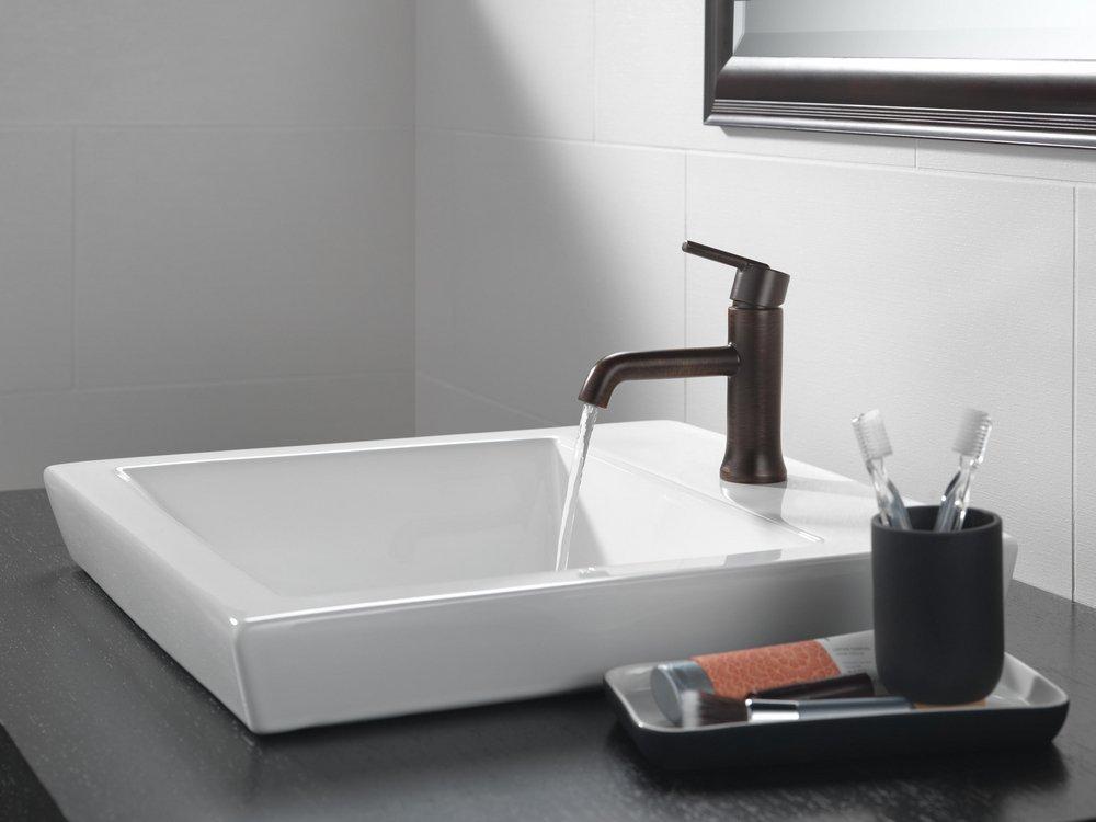 Delta Faucet Venetian Bronze Single Handle Monoblock Bathroom Sink Faucet with Metal Pop-Up Drain Assembly 